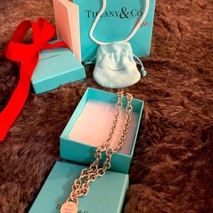 Tiffany and Co. round padlock necklace.